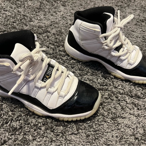 Nike Air Jordan 11 Kids Black and White Sneakers with gold jumpman - Picture 2 of 7